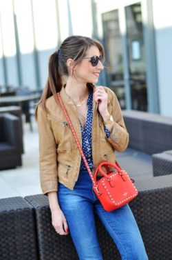 red mini bag valentino rockstud brown leatherjacket flared jeans casual outfits styleblogger