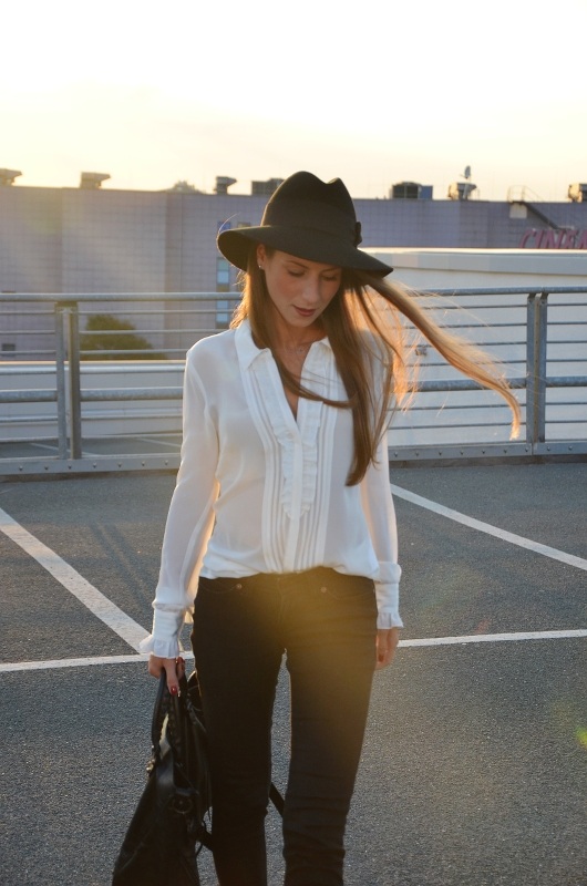 frill blouse outfit hat black skinny jeans ankle boots balenciaga bag