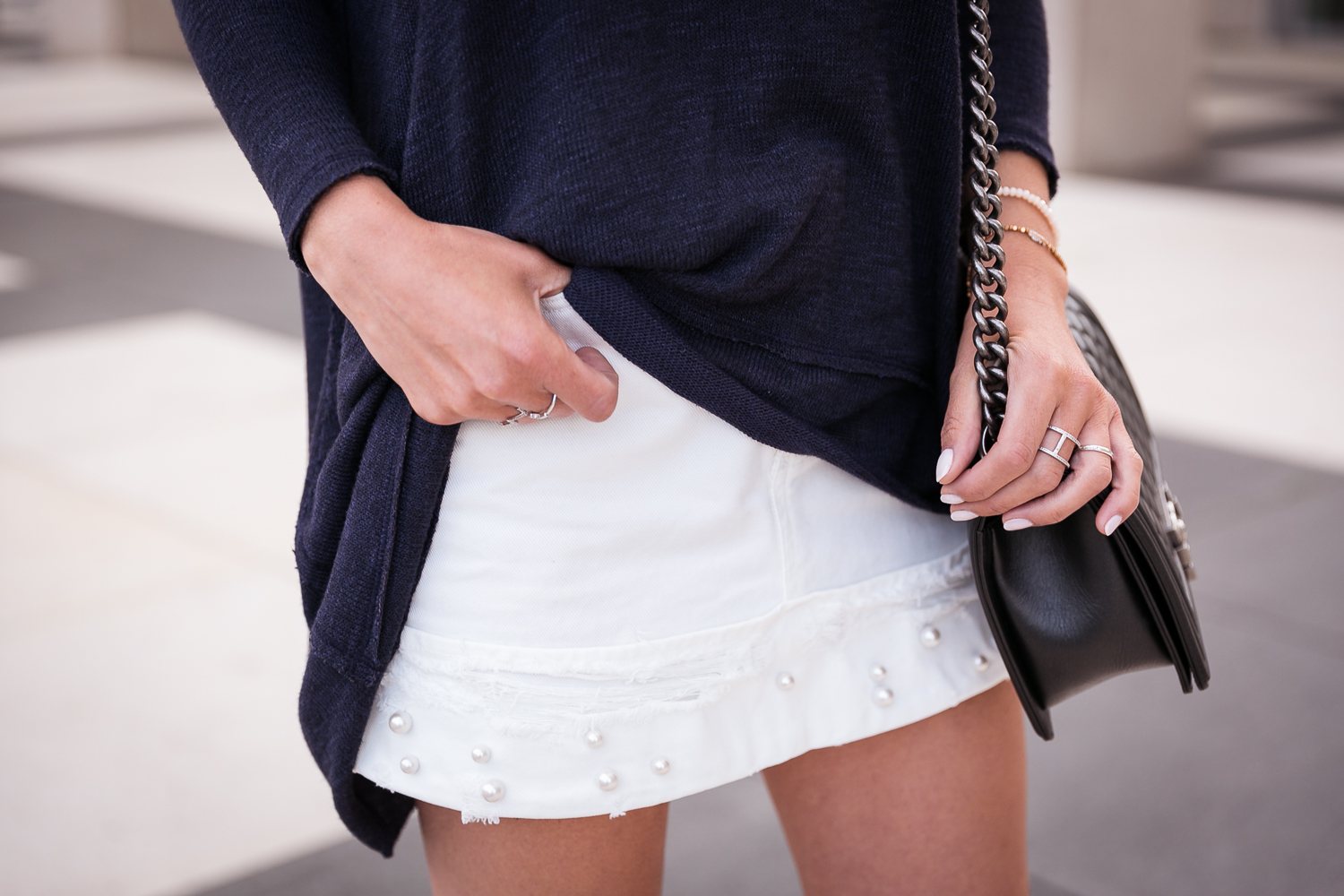 white skirt pearls blue top silver sandals zara chanel boy bag chic summer outfit