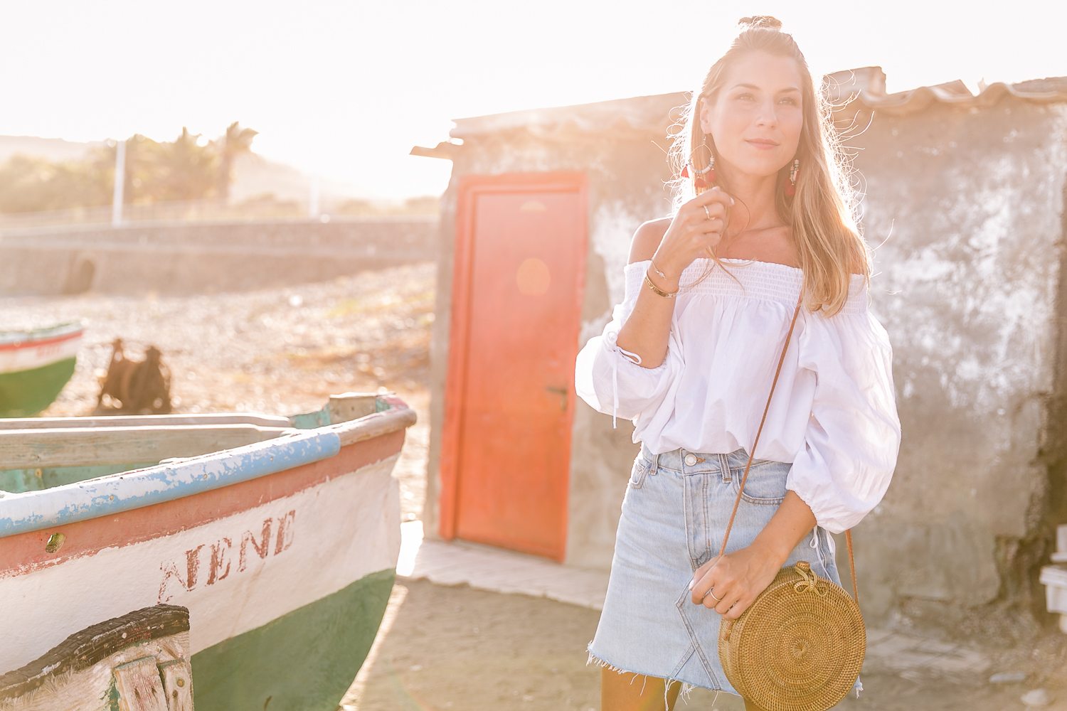 red shoes outfit jeans skirt denim off the shoulder top straw bag summerlook fashionblog 8