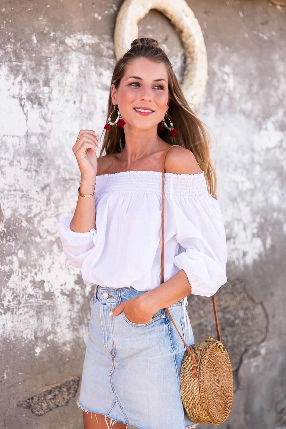 red shoes outfit jeans skirt denim off the shoulder top straw bag summerlook fashionblog 3