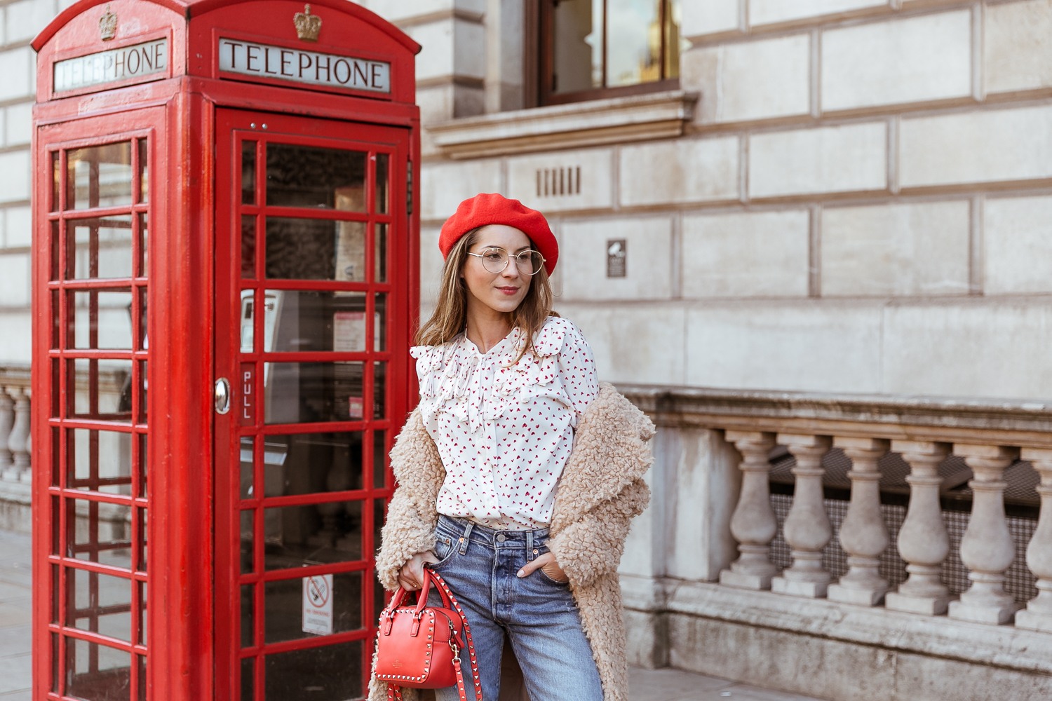 teddy coat levis 501 jeans red hat steffen schraut blouse hearts red valentino bag outfit street style london white boots veja du street style